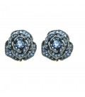 Rozen oorclips met blauwe strass steentjes